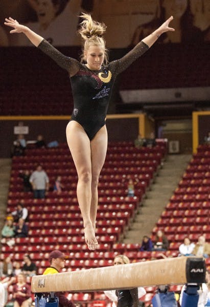Senior Amelia Rew at a Jan. 12 meet against Oklahoma. This Friday, the Gym Devils head to Utah to face the third ranked team. (Photo by Molly J Smith)