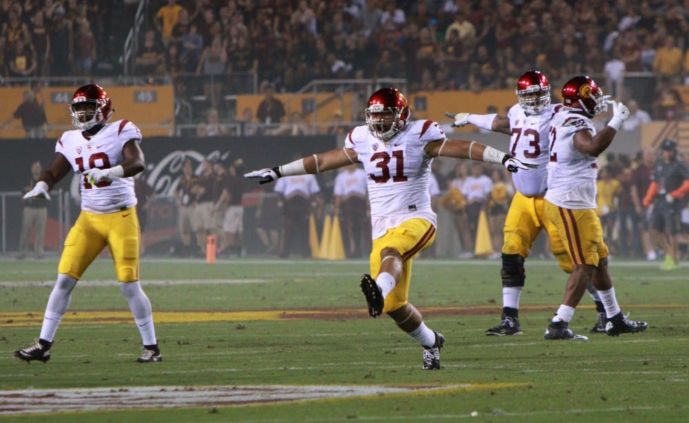 USC fullback Soma Vainuku (31) reacts after a missed field goal by Arizona State Saturday, Sept. 26, 2015 at Sun Devil Stadium in Tempe. 