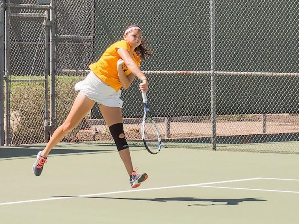 Senior Leighann Sahagun returns the serve to San Jose State during a doubles match with Sun Devil partner, Joanna Smith, Friday, March 20, 2015, at Whiteman Tennis Center in Tempe. (J. Bauer-Leffler/The State Press)