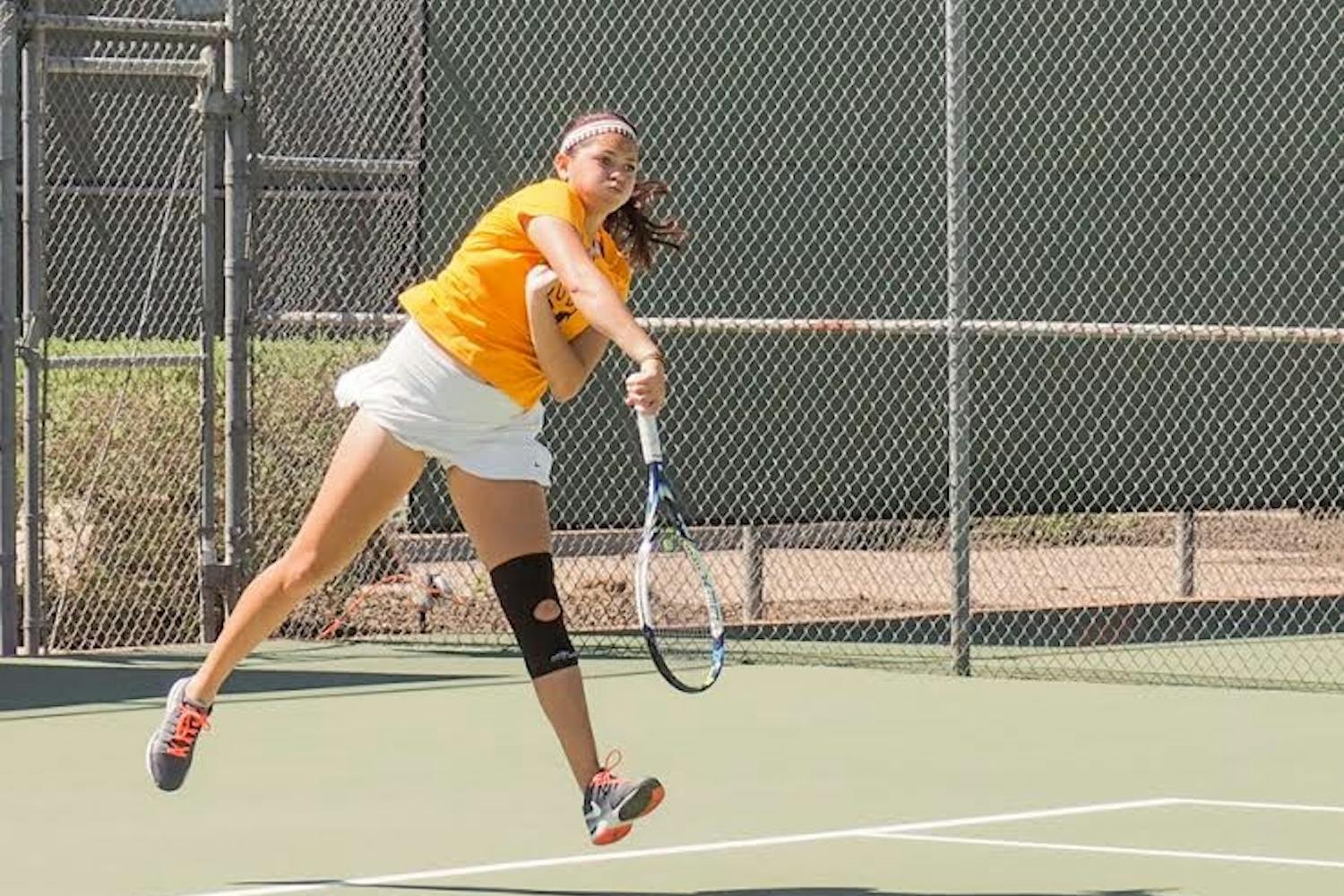 Senior Leighann Sahagun returns the serve to San Jose State during a doubles match with Sun Devil partner, Joanna Smith, Friday, March 20, 2015, at Whiteman Tennis Center in Tempe. (J. Bauer-Leffler/The State Press)