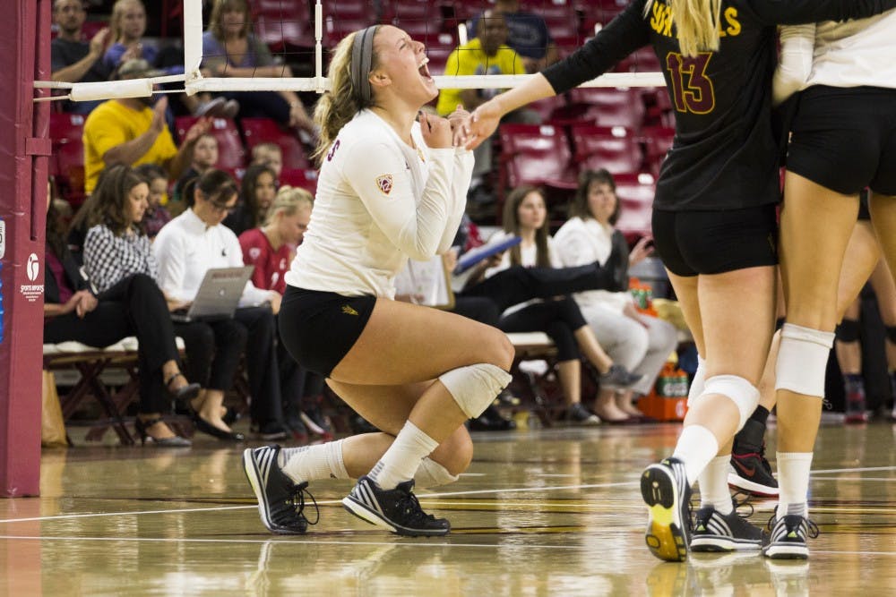 Freshman outside hitter Lexi Maclean (14) reacts after scoring a point against Washington State on Sunday, Nov 8, 2015, at the Sun Devil Stadium in Tempe.