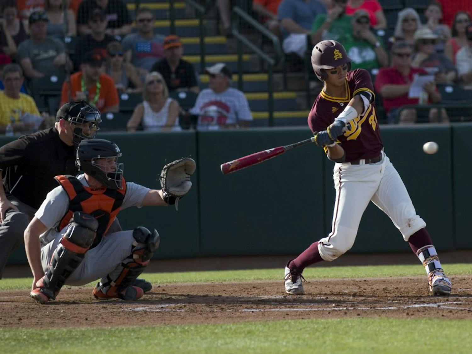 ASU freshman infielder Lyle Lin (27) swings the bat during game two of a baseball series against the Oregon State Beavers at Phoenix Municipal Stadium in Phoenix on Friday, March 17, 2017. ASU lost 10-1. 