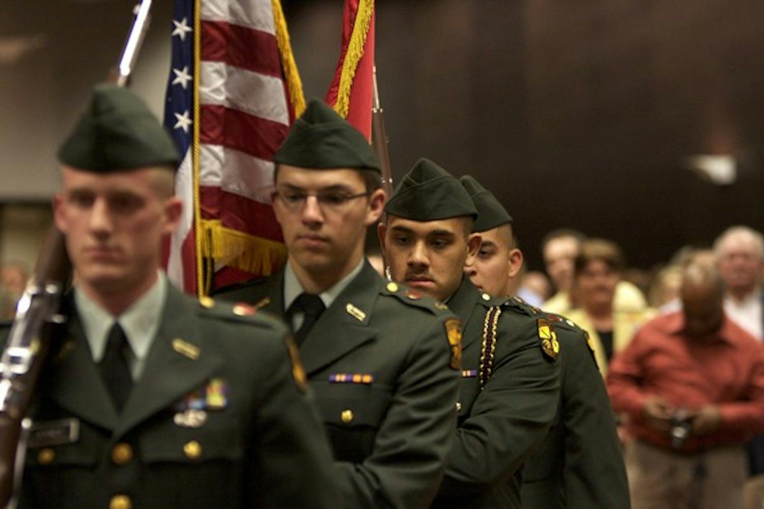 ROTC COMMENCEMENT: Members of the Army ROTC color guard march in the U.S. and Arizona flag during the Spring commencement. (Photo by: Scott Stuk)