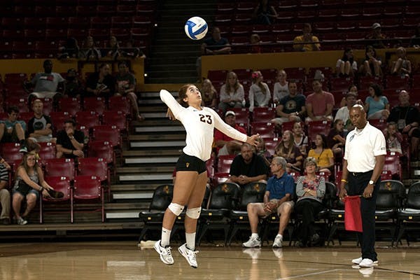 Sophomore libero Mia Mazon serves the ball in a match against Pepperdine in a home game at Wells Fargo Arena on Saturday Sept. 20, 2014. (Photo by Mario Mendez)