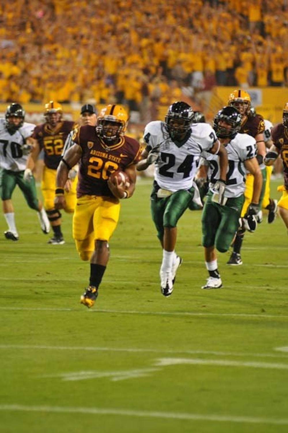 ON THE RUN: ASU sophomore running back Cameron Marshall races toward the end zone against Portland state last Saturday. Marshall scored three times on the ground in the Sun Devils 54-9 win. (Photo by Aaron Lavinsky)