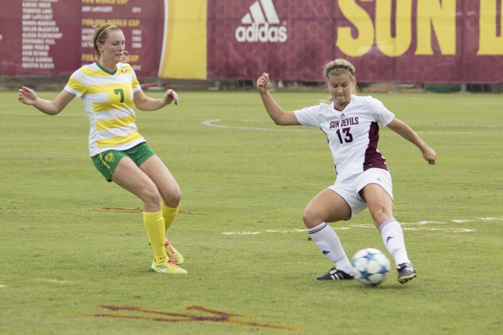 Senior defender Sara Tosti passes the ball upfield in the first half against Oregon on Sunday, Oct. 25, 2015, at Sun Devil Soccer Stadium in Tempe. The Sun Devils defeated the Ducks 1-0.
