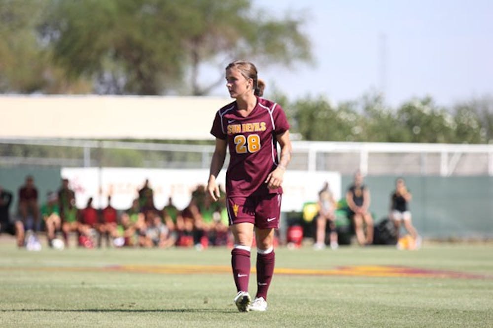 Senior midfielder Taylor McCarter surveys the field during the Sun Devils’ 5-4 double overtime win over USC on Sept. 28. (Photo by Kyle Newman)