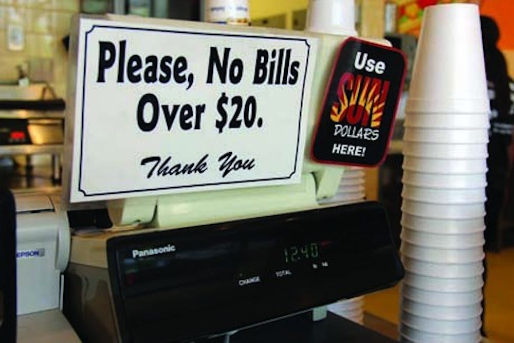 SHAWN RAYMUNDO | The State Press |
Sun Dollars are due to be phased out this summer, which could pose a problem for businesses that make large portions of their profits from Sun Dollar purchases.