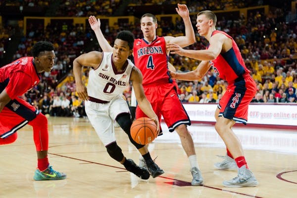 Freshman guard Tra Holder drives to the basket against Arizona, Saturday, Feb. 7, 2015 at Wells Fargo Arena in Tempe. The Sun Devils defeated the Wildcats 81-78.