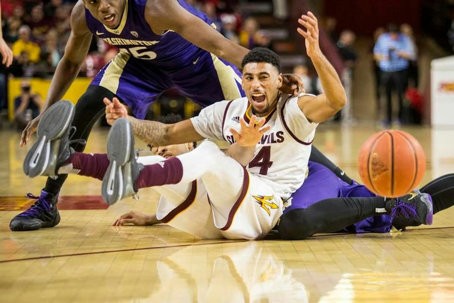 Andre Spight fights for the loose ball against Washington on Saturday, January 16, 2016 at Wells Fargo Arena in Tempe. ASU would lose the game 89-85.