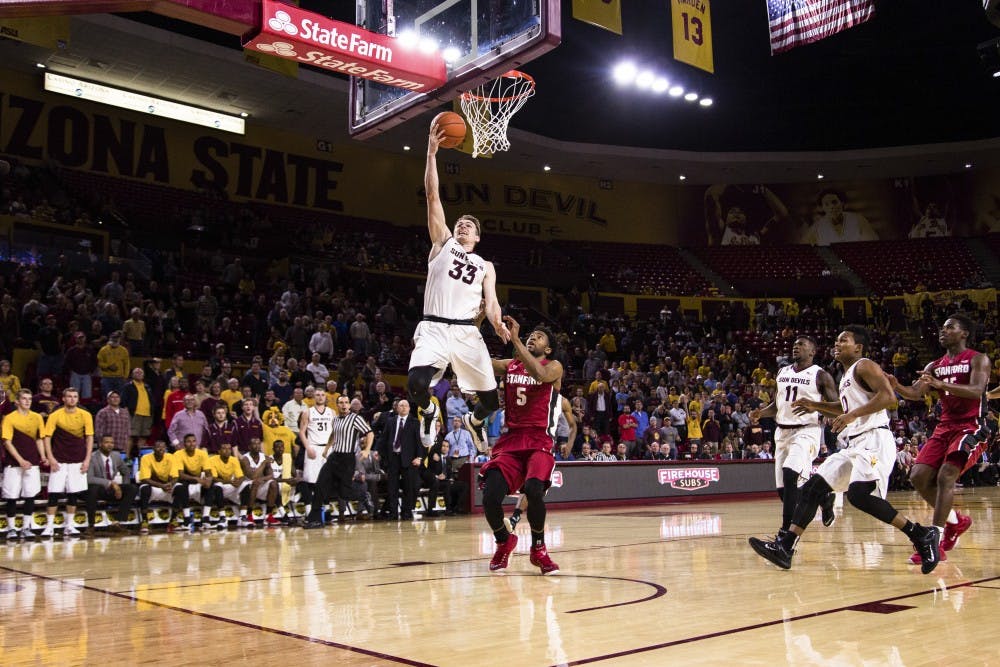 ASU junior guard Elisha Davis leads the team in celebration after the ASU defense holds in the final seconds of ther 53-52 victory over Stanford on Feb. 6, 2015, at the Wells Fargo Arena. (Daniel Kwon/The State Press)