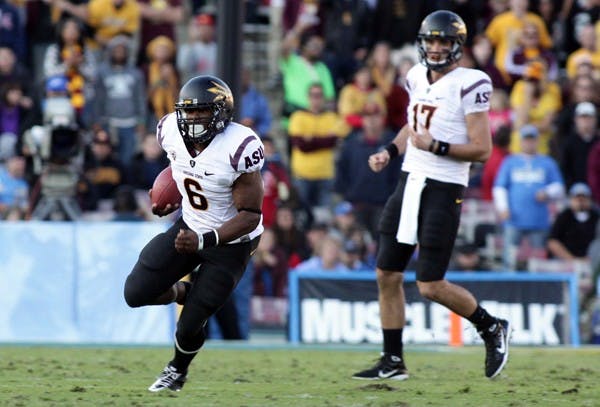 ANKLE TEST: ASU junior running back Cameron Marshall runs out from the backfield during the Sun Devils’ 29-28 loss to UCLA on Saturday. Marshall did not practice on Tuesday due to an ankle injury, but should be fine coming into ASU’s next game against Washington State. (Photo by Beth Easterbrook)