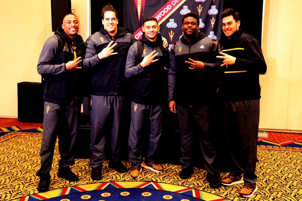 Arizona State football players (from left to right) Lloyd Carrington, Nick Kelly, D.J. Foster, Tashon Smallwood, and Mike Bercovici pose for a picture during Arizona State Media Day for the Cactus Bowl held at Camelback Inn on Thursday, Dec. 31, 2015, in Scottsdale, Arizona.