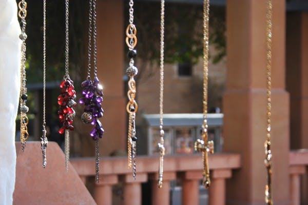 Winter Artfest covered Hayden Lawn on Thursday. Artists sold their work and entered in a raffle where the winning top prize was a scholarship of $200. (Photo by Manikandan Vijayakumar)