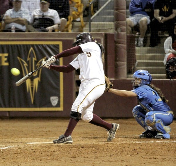 Amber Freeman hits the ball in the Wilson/DeMarini Invitational on March 5. Freeman hit a three-run home run to lift the Sun Devils past the Beavers on Wednesday. (Photo by Sam Rosenbaum)