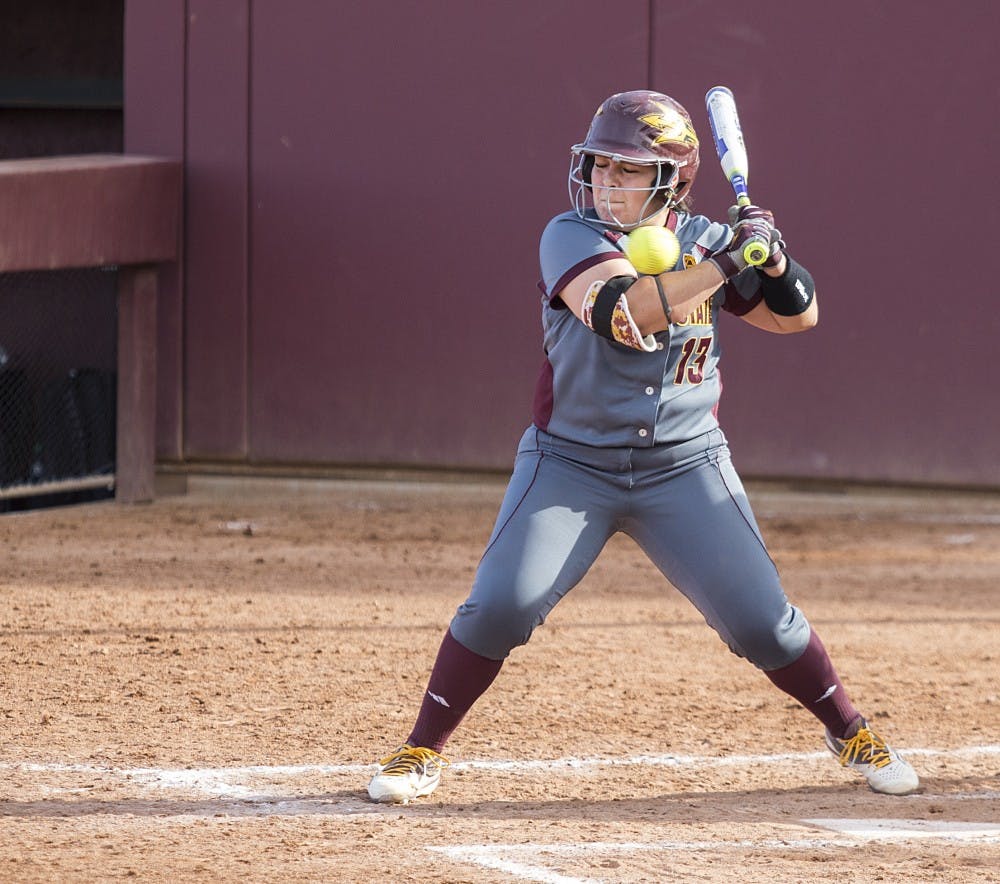 Junior catcher Sashel Palacios is hit by a ball during a game against Portland State at Alberta B. Farrington Softball Stadium in Tempe, Arizona, on Sunday, Feb. 14, 2016. The Sun Devils won the game, 7-1.