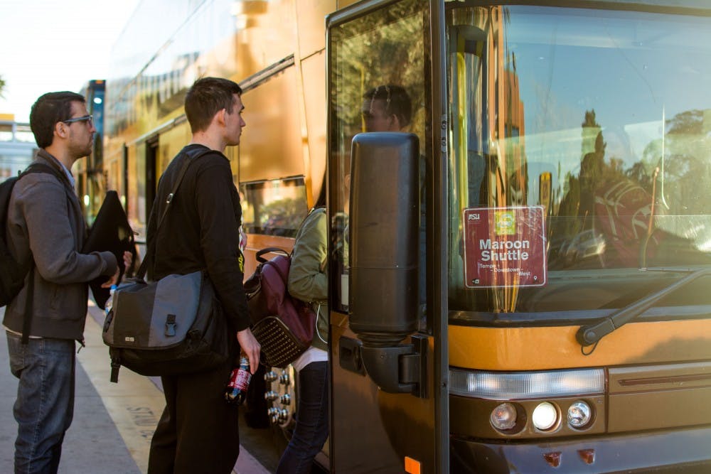 Students board the Maroon Shuttle on ASU’s Tempe campus on Dec. 1, 2016. ASU’s intercampus shuttle system allows students to travel between all five campuses. 