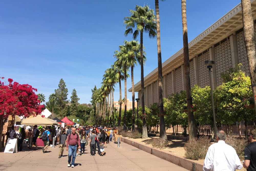People walk on the ASU Tempe campus on Mar. 16, 2016.