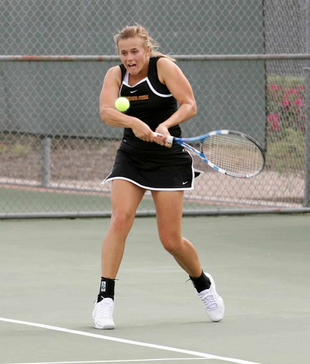 Michelle Brycki hits a backhand at the ASU Thunderbird Invitational on Nov. 4, 2011. Brycki has assumed a leadership role in her senior season with the Sun Devils. (Photo by Beth Easterbrook)