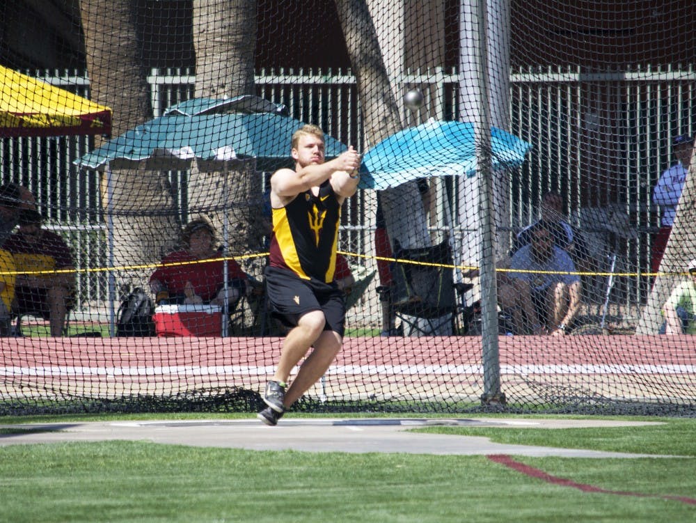 ASU sophomore Kyle Long throws the hammer the Hammer Throw on Friday, March 20, 2015, at the Sun Angel Stadium in Tempe. Long placed fifth with a mark of 60.14 meters. (Krista Tillman/The State Press)