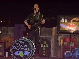 The Slow Poisoner, Andrew Goldfarb, performs onstage at Lawn Gnome Publishing on June 24, 2016. Lawn Gnome is a bookstore and publishing company that hosts a variety of arts-related events in central Phoenix.&nbsp;