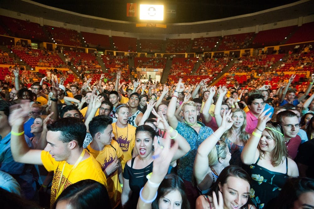 Incoming freshmen and other ASU students cheer during ASU's Fall Welcome Concert on Tuesday, Aug. 18, 2015, at Wells Fargo Arena in Tempe.