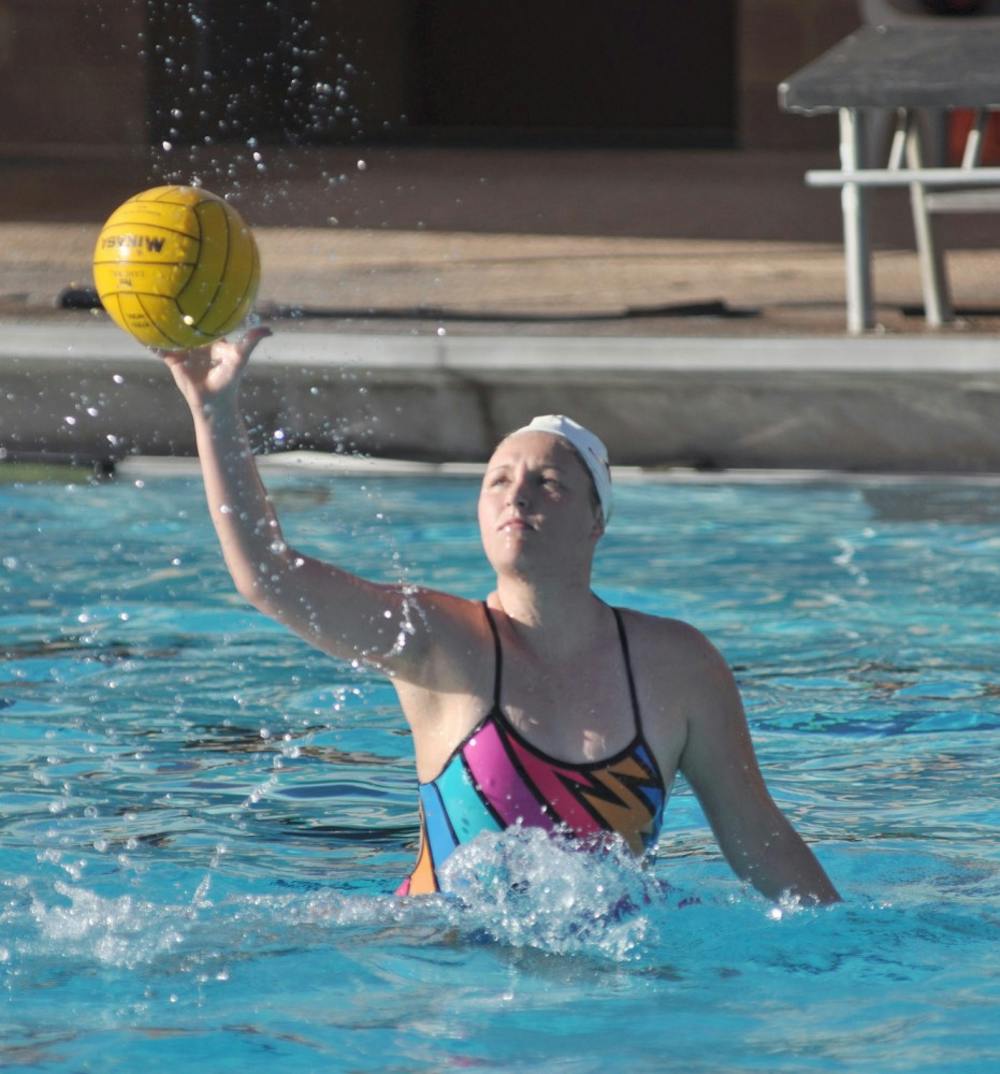 Lead woman: ASU freshman Paige Hacker receives a pass during practice on Feb. 24. Hacker is the first Arizonan to play for ASU, blazing a trail for water polo players in the state. (Photo by Sierra Smith)