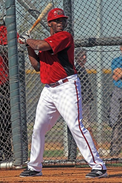 Justin Upton works on his swing at batting practice on Monday. Upton and the Diamondbacks are working hard during spring training in hopes of repeating the success the club had last season. (Photo by Lisa Bartoli)