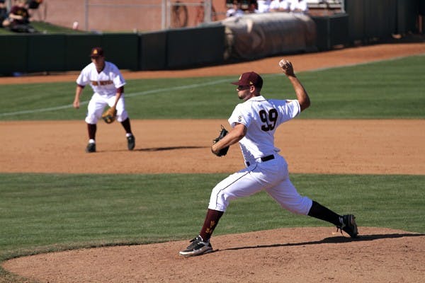GATHER AROUND: ASU freshman infielder Deven Marrero, senior outfielder Kole Calhoun and sophomore infielder Zach Wilson gather during a pitching change in the Sun Devils' 11-6 win over San Diego on Tuesday at Packard Stadium. (Photo by Scott Stuk)