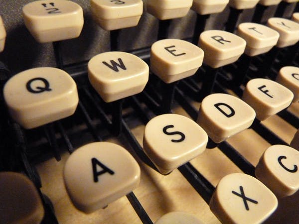 BACK TO THE OLD SCHOOL: ASU secondary education graduate Ryan Adney is finding a new way to bring old technology into his classroom. The 10th graders in Adney's English class use 14 typewriters in order to type up a daily journal. (Photo by Harmony Huskinson)