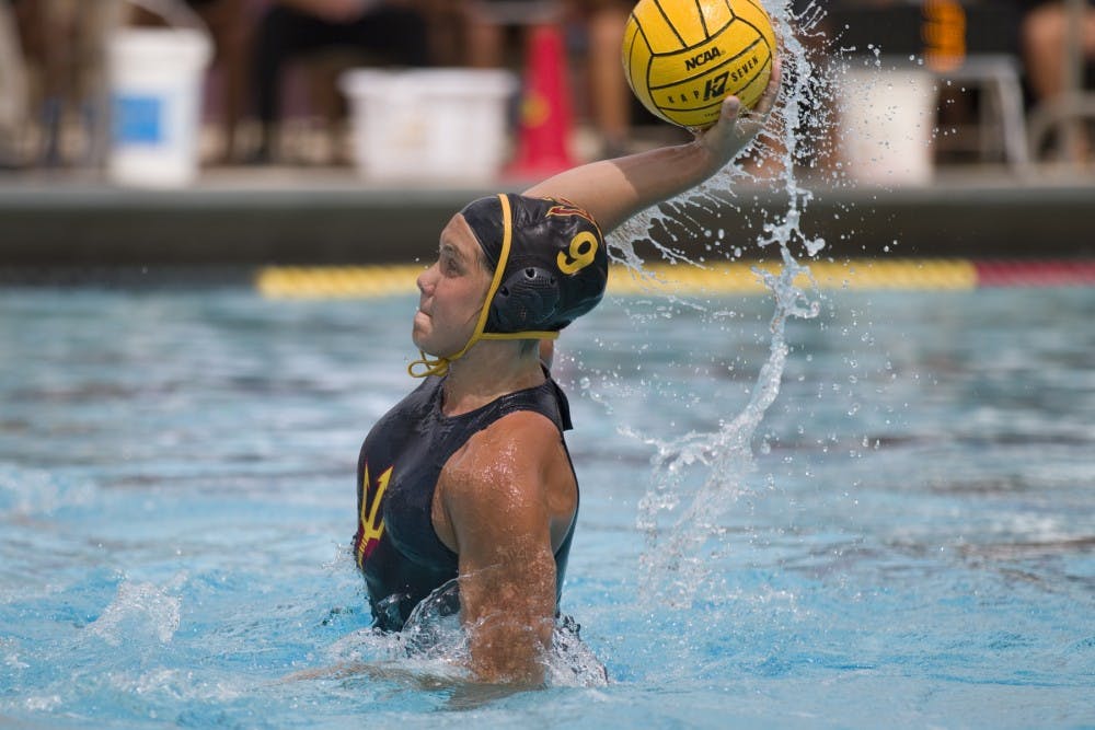 ASU junior Lena Mihailovic (9) rises up to shoot during a water polo match versus the no. 3 UCLA Bruins at Mona Plummer Aquatic Center in Tempe, Arizona on Saturday, April 8, 2018. ASU lost 13-5.