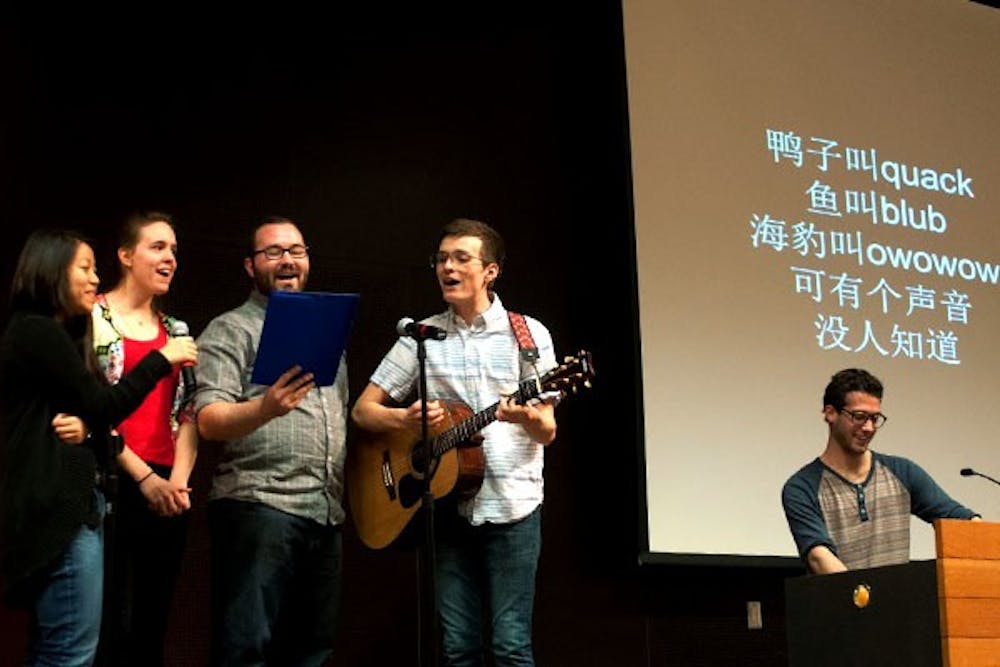 A group of students from a second year Chinese language class sing ‘'What Does The Fox Say’’ by Ylvis in Chinese. Students and teachers alike gather at ASU’s annual Chinese New Years Celebration that is directed by Madeline Spring. (Photo by Mario Mendez)