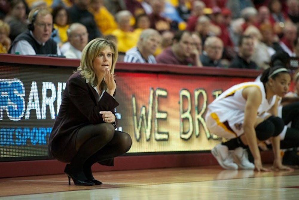 Taking a Break: ASU coach Charli Turner Thorne gives out commands to her players during the Sun Devils’ game against Stanford on Feb. 3 in Tempe. Turner Thorne announced in a press conference Monday afternoon that she will be taking a nine-month leave of absence from the team for her own personal growth and development. (Photo by Michael Arellano)