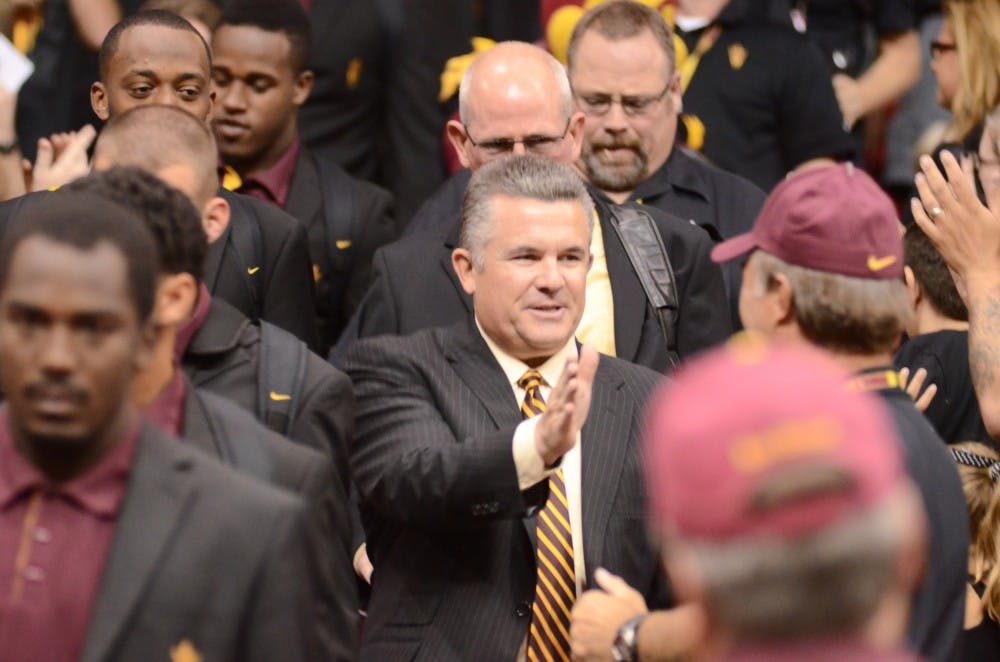 PASS PROTECTORS: Redshirt junior offensive lineman Mike Marcisz, junior tight end trevor Kohl and redshirt junior Garth Gerhart walk off the field ahead of the player they protect, redshirt junior quarterback Steven Threet. (Photo by Aaron Lavinsky)