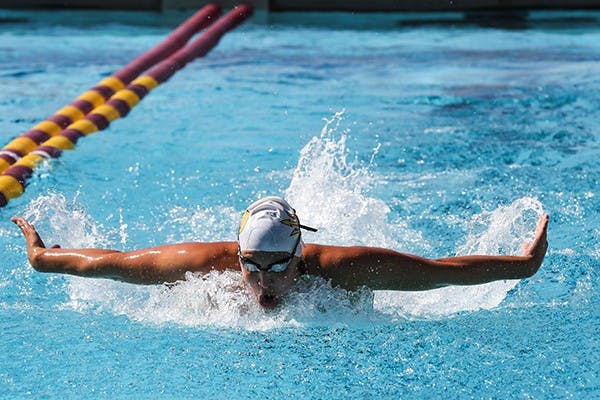  Junior Lori Lanye Kremer swims the 200 yard butterfly at the match in Tempe.