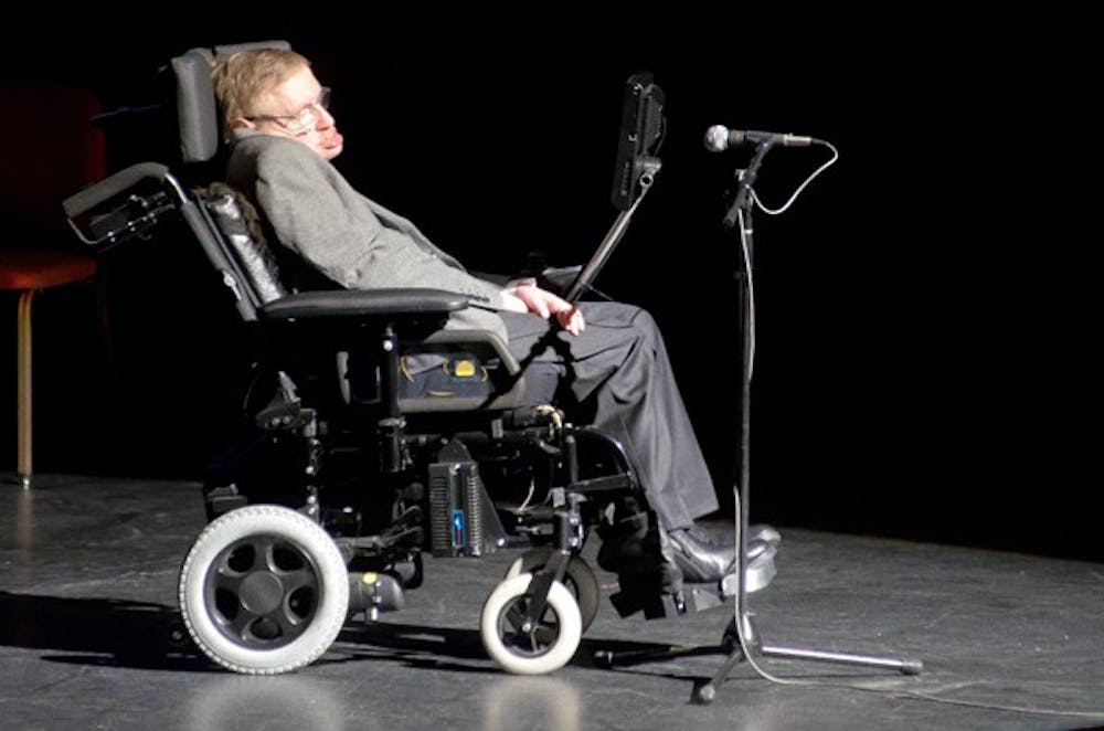 A CAREER IN THEORY: Famed cosmologist and theoretical physicist Stephen Hawking addresses an audience at Gammage Theater on Saturday night following a performance of Gustav Holst’s “The Planets” by the ASU Symphony Orchestra. The event was presented by the ASU Origins Project and was hosted by its director, ASU professor Lawrence Krauss. (Photo by Aaron Lavinsky)