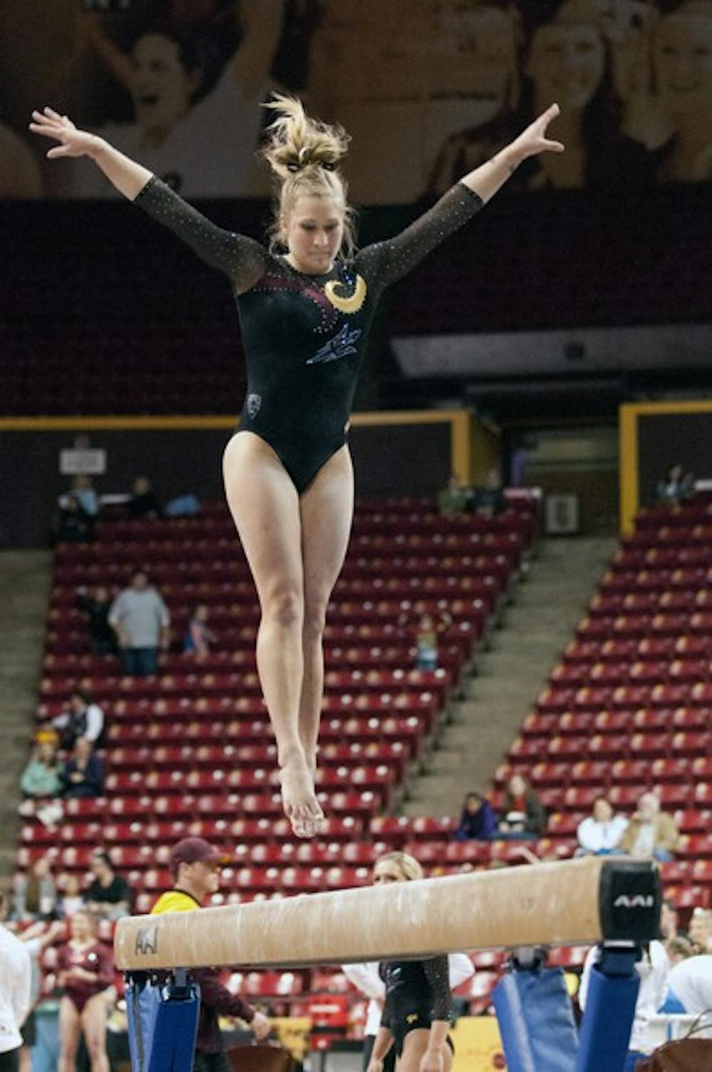 Senior Amelia Rew at a Jan. 12 meet against Oklahoma. This Friday, the Gym Devils head to Utah to face the third ranked team. (Photo by Molly J Smith)
