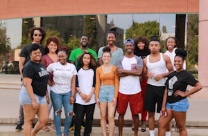 The organizing team of the&nbsp;Zaria fashion show poses for a photo on ASU's Tempe campus on Sunday, April 9, 2017.