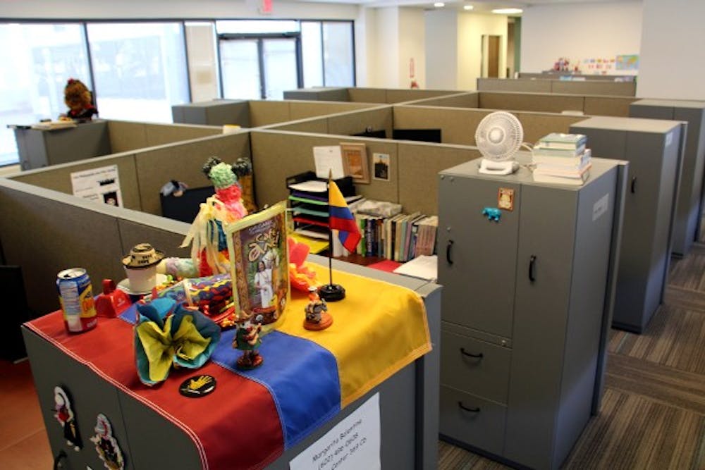 The new office inside the Arizona Center include cubicle spaces for various faculty members of the College of Letters and Sciences. Few faculty members have settled in completely and many are still working out of boxes. (Photo by Tynin Fries)