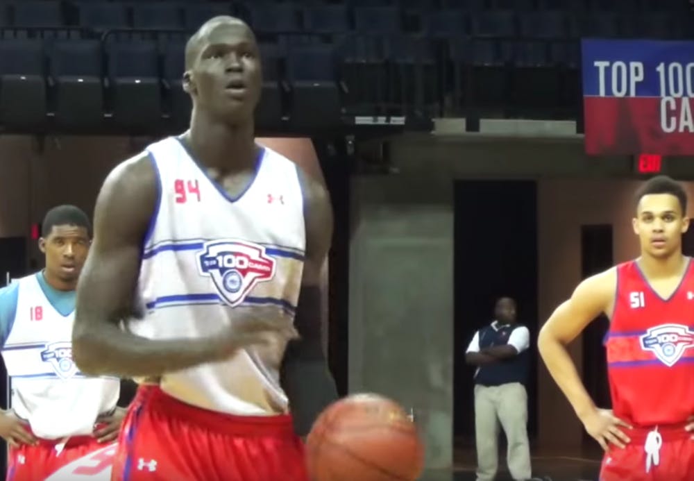 Thon Maker stands at the free throw line.