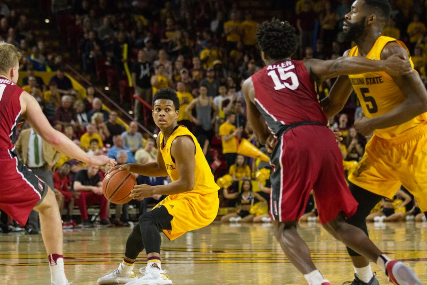 ASU junior guard, Tra Holder, looks for a pass during a men's basketball game versus the University of Stanford Cardinal in Wells Fargo Arena in Tempe, Arizona on Saturday, Feb. 11, 2017. ASU won 75-69.