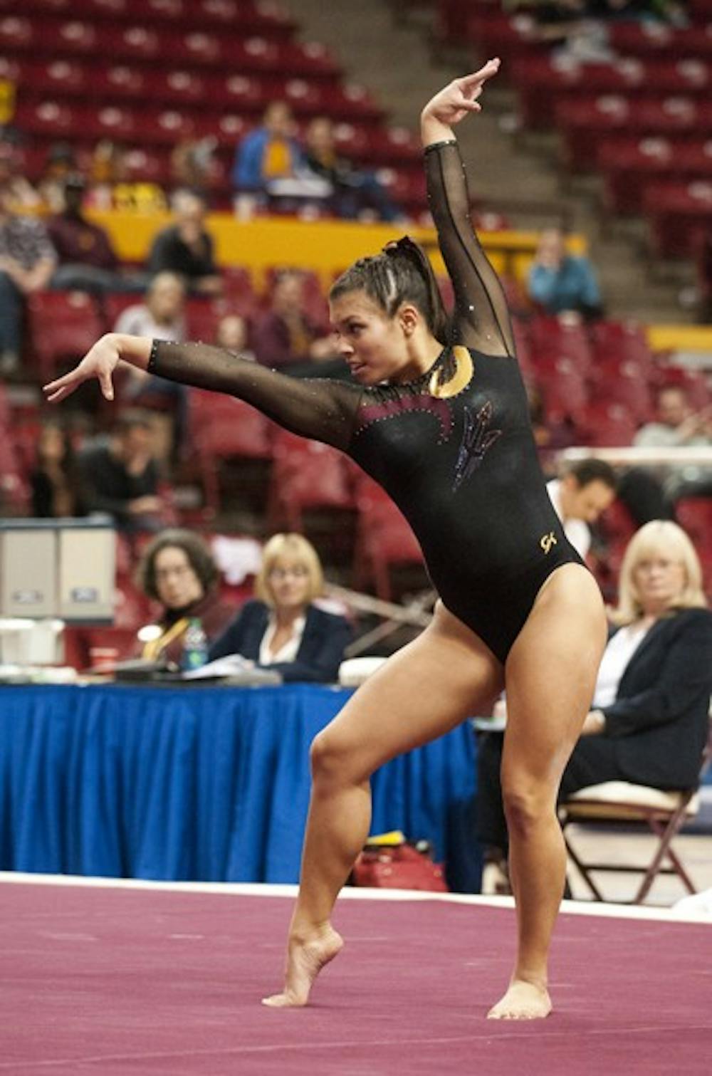 Freshman Allie Salas performs a floor routine at the Jan. 12 meet against Oklahoma. The Sun Devils face UCLA this weekend at home. (Photo by Molly J Smith)