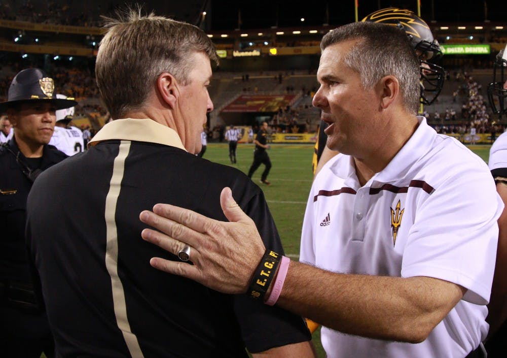 Head coach Todd Graham shakes hands with Colorado head coach Mike MacIntyre after the game against Colorado on Saturday, Oct. 10, 2015, at Sun Devil Stadium in Tempe. The Sun Devils defeated the Buffaloes 48-23.