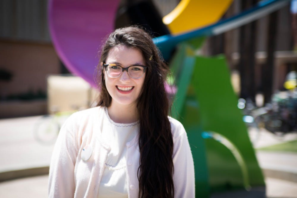 Senior English Literature major Shelby Stringer poses outside the art plaza at ASU on Thursday,  April 28, 2016.
