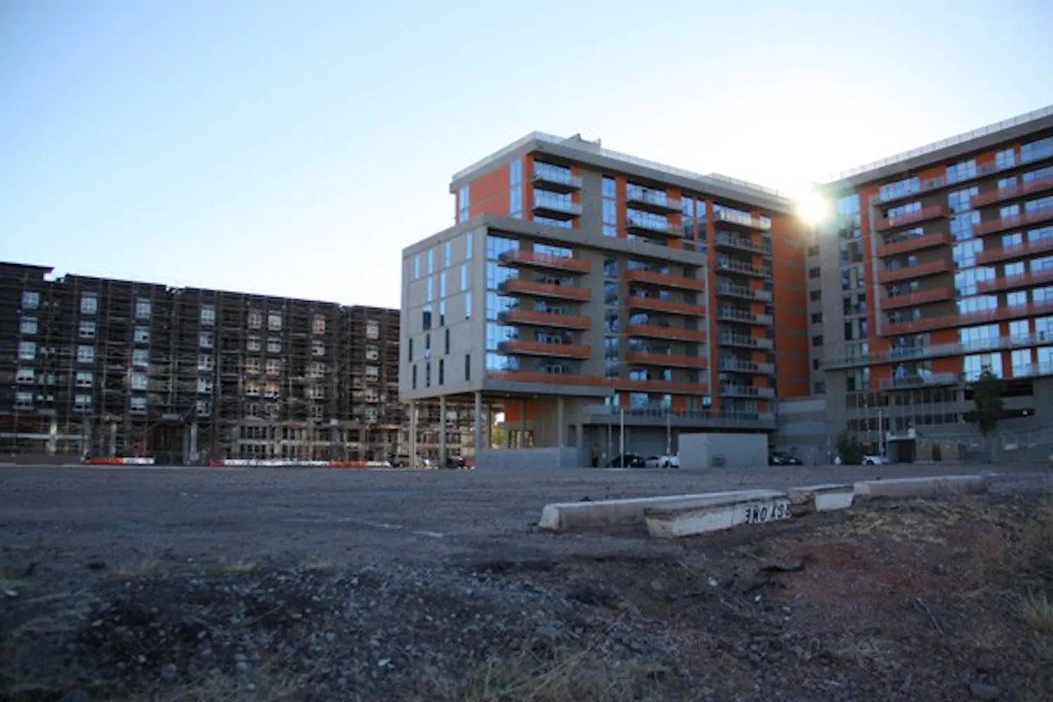 The Grove, expected to begin construction on the empty lot before 2014, has sparked controversy with the City of Tempe and surrounding neighborhoods as high-rise housing developments continue to increase near campus. (Photo by Shawn Raymundo)