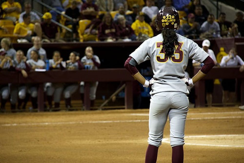 Senior outfielder Alix Johnson stands at first base waiting for the next pitch during the game against Arizona at Farrington Stadium on Sunday, March 30. (Photo by Becca Smouse)