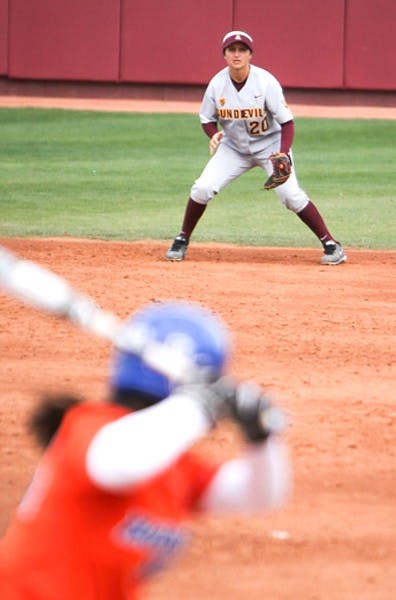 Senior second baseman Sam Parlich prepares to take a possible ground ball from a Boise State batter on Feb. 10. Parlich tried to relax more on the diamond and react more to the ball, which caused her defensive improvement. (Photo by Sam Rosenbaum)