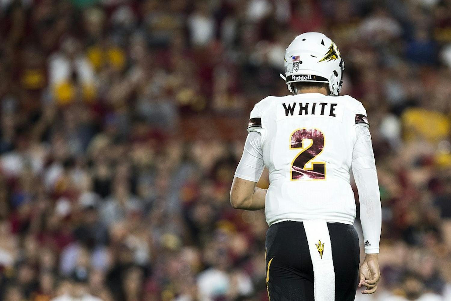 ASU Sun Devils quarterback Brady White (2) walks back toward the line of scrimmage after a play in the second half of a game against the USC Trojans in the Los Angeles Memorial Coliseum on Saturday, Oct. 1, 2016. 