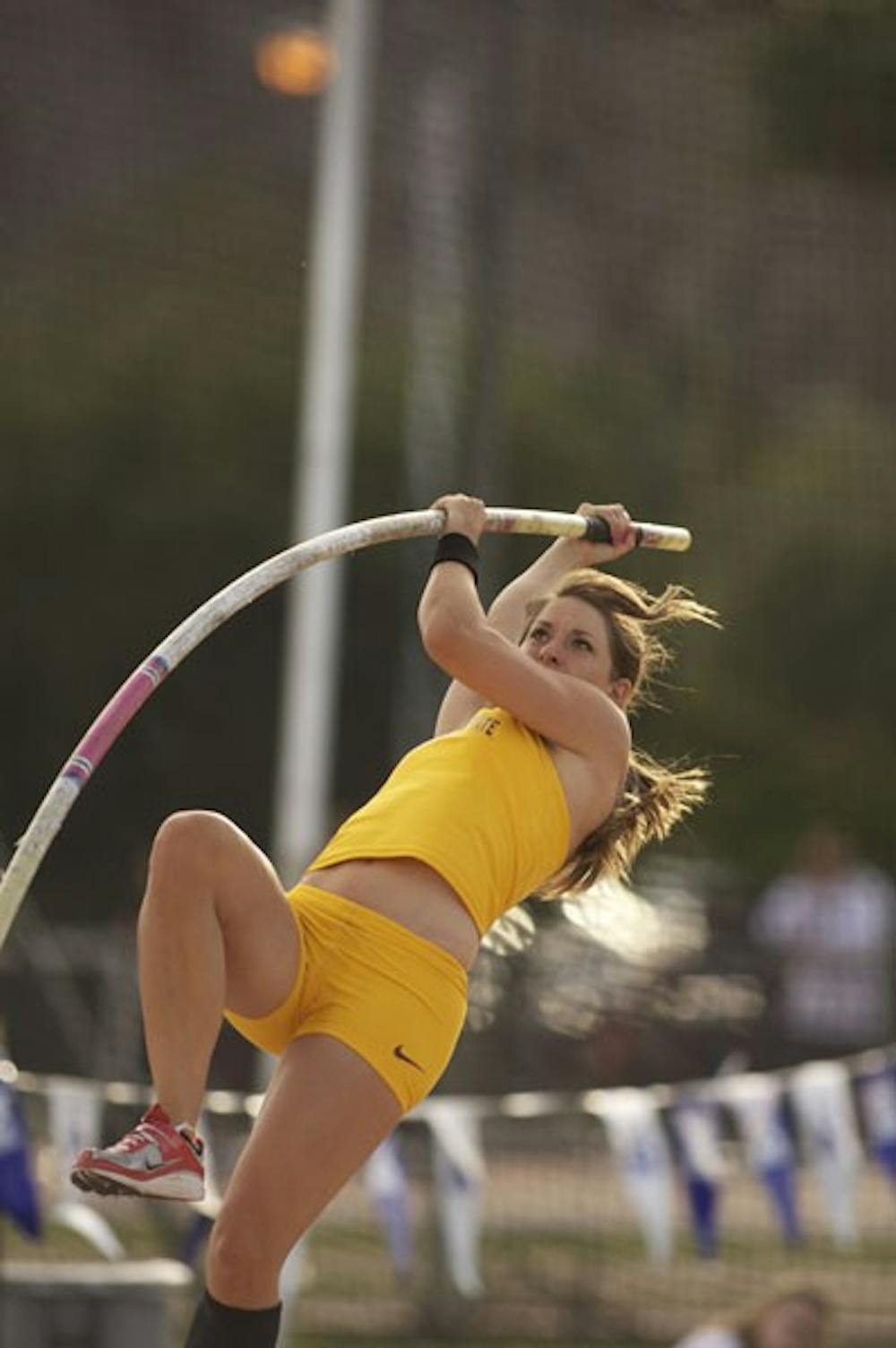 WE HAVE LIFTOFF: Sophomore pole vaulter Cara Carpenter starts her ascent at the Baldy Castillo Invite on March 20 at Sun Angel Stadium. (Photo by Michael Arellano)