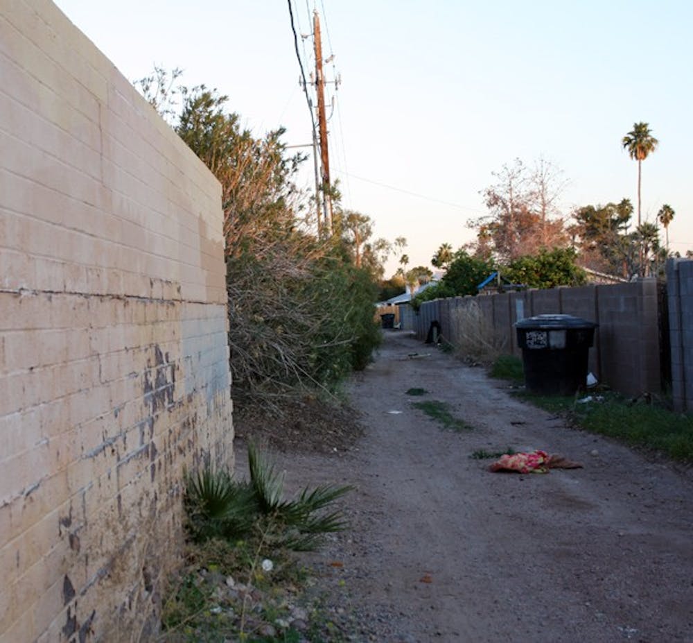 The proposed Solid Waste Alley Ordinance hopes to go into effect within the next two months. The ordinance will provide Tempe Police officers the ability to kick out transients, unwanted riffraff and illicit activity. (Photo by Shawn Raymundo)